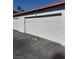 Spacious one-car garage providing ample parking and storage space at 171 Greenbriar Townhouse Way, Las Vegas, NV 89121