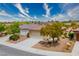 Aerial view of a home featuring desert landscaping and a paved driveway at 1782 Black Fox Canyon Rd, Henderson, NV 89052
