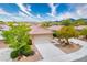 Aerial view showcasing the home's desert landscaping and spacious driveway at 1782 Black Fox Canyon Rd, Henderson, NV 89052