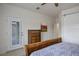 The bedroom includes a sliding door access to the bathroom, with a walk out patio, and a dresser at 1782 Black Fox Canyon Rd, Henderson, NV 89052