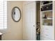 Neat closet space with white shelving, drawers, and hanging space near a window providing natural light at 1782 Black Fox Canyon Rd, Henderson, NV 89052