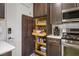 Kitchen pantry features pull out shelves for easy access and storage at 1782 Black Fox Canyon Rd, Henderson, NV 89052