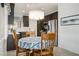 Eat in kitchen with dark wood cabinets and a large island at 1782 Black Fox Canyon Rd, Henderson, NV 89052