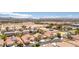 Aerial view of residential community with desert landscape and mountain views at 1963 Dakota Lodge Ave, Las Vegas, NV 89123