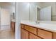 Bright bathroom with a single vanity and attached bedroom at 1963 Dakota Lodge Ave, Las Vegas, NV 89123
