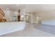 Bright and neutral open floorplan with kitchen, living room, and dining space at 1963 Dakota Lodge Ave, Las Vegas, NV 89123