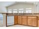 Kitchen area featuring stainless appliances, granite counters and a breakfast bar at 1963 Dakota Lodge Ave, Las Vegas, NV 89123