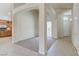 Expansive living area showcasing neutral colors, carpet, and an open layout to the kitchen at 1963 Dakota Lodge Ave, Las Vegas, NV 89123