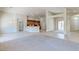 Bright living area features bar, access to kitchen, and neutral paint with an open floor plan at 1963 Dakota Lodge Ave, Las Vegas, NV 89123