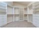 Spacious walk-in closet with custom shelving and drawers for optimal storage at 1963 Dakota Lodge Ave, Las Vegas, NV 89123