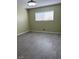 Neutral bedroom with modern lighting and wood-look flooring with window views at 212 Orland St # 22, Las Vegas, NV 89107