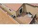 Aerial view of the patio and backyard with brick flooring at 2213 Chandler Ranch Pl, Laughlin, NV 89029
