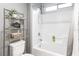 Bathroom featuring a tub and shower combination, neutral decor, and ample space at 2213 Chandler Ranch Pl, Laughlin, NV 89029