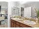 Bright bathroom featuring a double sink vanity with granite countertops at 2213 Chandler Ranch Pl, Laughlin, NV 89029