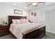 Comfortable bedroom features a ceiling fan and a plush bed with decorative pillows at 2213 Chandler Ranch Pl, Laughlin, NV 89029