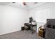 Bright room with a ceiling fan, carpet, and window providing natural light at 2213 Chandler Ranch Pl, Laughlin, NV 89029