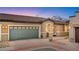 Charming home featuring a lush, landscaped yard and a two-car garage at 2213 Chandler Ranch Pl, Laughlin, NV 89029