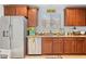 Kitchen featuring granite countertops, stainless steel appliances, and decorative accents at 2213 Chandler Ranch Pl, Laughlin, NV 89029