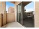 Balcony with sliding glass door and view to the outside at 2232 Aspen Mirror Way # 202, Laughlin, NV 89029