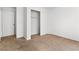 Bedroom featuring neutral carpet, closet and bright, neutral paint at 2232 Aspen Mirror Way # 202, Laughlin, NV 89029