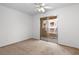 Bright bedroom with ceiling fan and sliding glass door to balcony at 2232 Aspen Mirror Way # 202, Laughlin, NV 89029