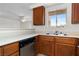 Cozy kitchen area with essential appliances and wooden cabinets, providing a functional space for meal preparation and storage at 2232 Aspen Mirror Way # 202, Laughlin, NV 89029