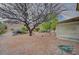 Backyard featuring desert landscaping and a covered patio at 2353 Lauren Dr, Las Vegas, NV 89134