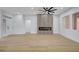 Spacious living room features modern fireplace with wooden flooring and natural light at 2353 Lauren Dr, Las Vegas, NV 89134