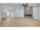 Spacious living room with wood floors, fireplace and ample natural light at 2353 Lauren Dr, Las Vegas, NV 89134