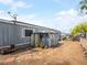 Spacious backyard features a shed, pathway, and plenty of room for outdoor activities at 240 Navajo Dr, Henderson, NV 89015