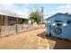 Backyard with a shed featuring unique decor, adding personality and character to the property at 240 Navajo Dr, Henderson, NV 89015