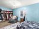 Bedroom with closet, chair, dresser, TV, and a window at 240 Navajo Dr, Henderson, NV 89015