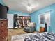 Bedroom with closet, chair, dresser, TV, and a window at 240 Navajo Dr, Henderson, NV 89015