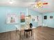 Bright dining room with hard wood floors, a modern table, and ample natural light at 240 Navajo Dr, Henderson, NV 89015