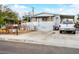Charming home with a welcoming front yard, parking, and a covered porch for outdoor enjoyment at 240 Navajo Dr, Henderson, NV 89015