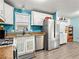 Clean kitchen featuring stainless steel appliances, granite counters and nice fixtures at 240 Navajo Dr, Henderson, NV 89015