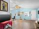 Spacious living room featuring hardwood floors, natural light, and neutral walls ready for personal touches at 240 Navajo Dr, Henderson, NV 89015
