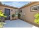 Private courtyard with sleek door and stucco walls providing an intimate outdoor space at 2673 Paris Amour St, Henderson, NV 89044
