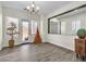 Dining room featuring wood-look floors and chandelier lighting at 2673 Paris Amour St, Henderson, NV 89044