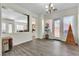 Dining room offers wood-look floors and views of the backyard at 2673 Paris Amour St, Henderson, NV 89044