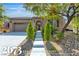 Charming single-story home with a well-manicured front yard and inviting entrance at 2673 Paris Amour St, Henderson, NV 89044