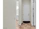 Hallway with access to a bathroom and a white front door at 2673 Paris Amour St, Henderson, NV 89044