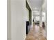 Hallway featuring tile and wood-look floors and neutral colors at 2673 Paris Amour St, Henderson, NV 89044