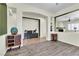 Open living area featuring tile and wood-look floors at 2673 Paris Amour St, Henderson, NV 89044