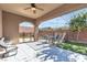 Outdoor patio featuring a chair, covered patio, swimming pool and turf at 2673 Paris Amour St, Henderson, NV 89044
