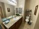 Bathroom featuring a vanity with sink, and built-in shelves and storage at 2719 Chinaberry Hill St, Laughlin, NV 89029