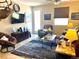 Comfortable living room with a plush seating area and a serene atmosphere offers a relaxing retreat at 2719 Chinaberry Hill St, Laughlin, NV 89029