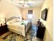 Bedroom features a tv, ceiling fan, and decorative bedside tables at 2719 Chinaberry Hill St, Laughlin, NV 89029