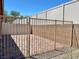 Paver patio area, enclosed with a secure fence, providing a private outdoor space at 2719 Chinaberry Hill St, Laughlin, NV 89029