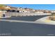 Street view showcasing neighborhood street and surrounding properties at 2719 Chinaberry Hill St, Laughlin, NV 89029